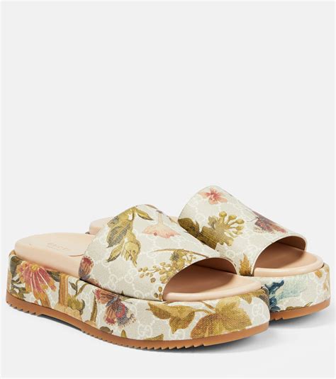 gucci womens shoe with flower on sale|Gucci floral platform slides.